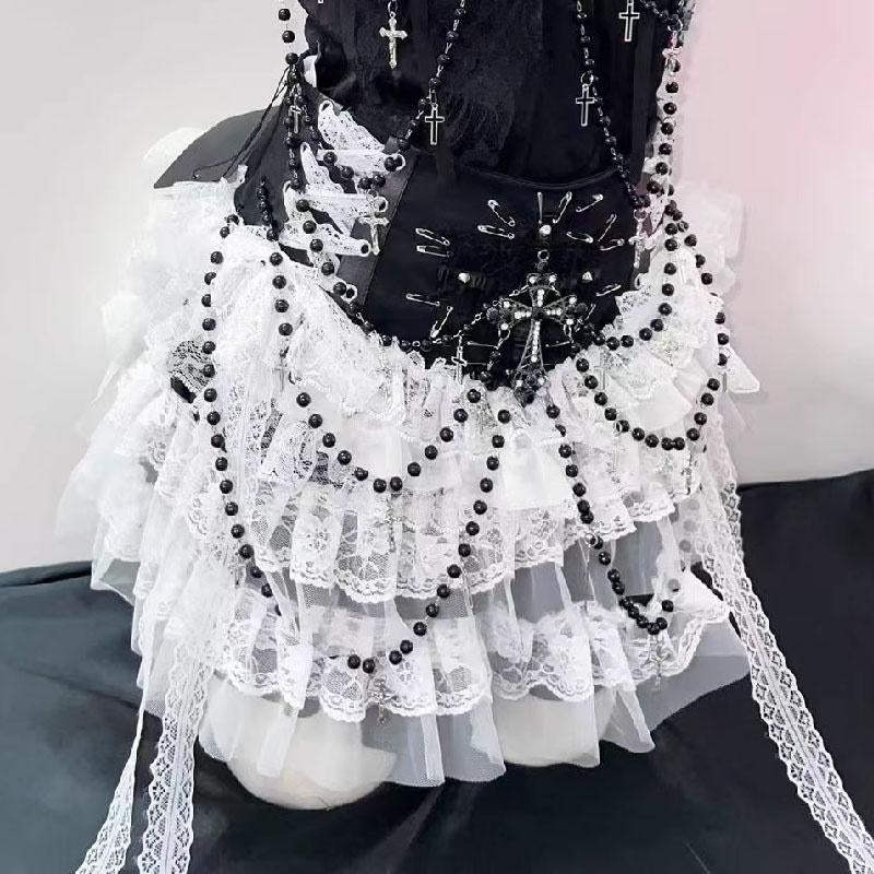 Ensemble mini-jupe froncée à volants et perles avec nœud papillon 