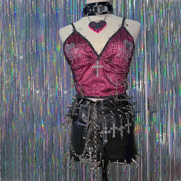 Minifalda con cremallera y apliques de remaches de cuero sintético con cadena de metal 