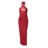 Vestido midi con cuello halter, espalda descubierta y aberturas con lazo 