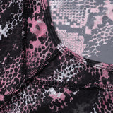 Mono de manga larga con estampado de piel de serpiente y malla transparente 