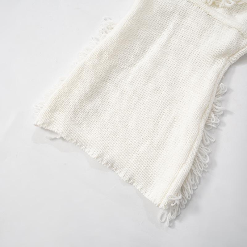 Minivestido de punto con espalda descubierta, borlas y cuello halter anudadas 