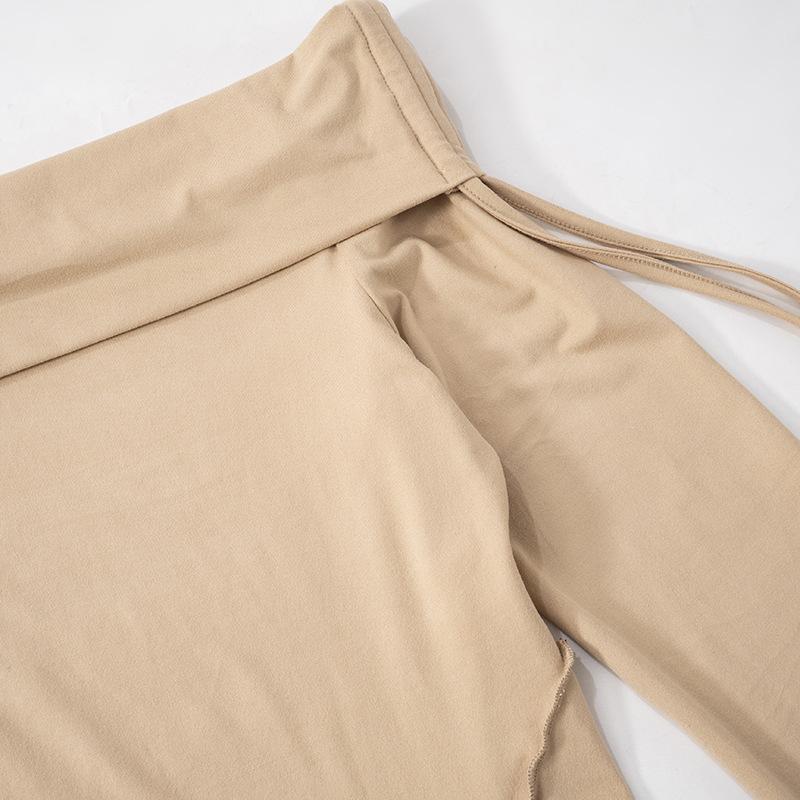 Long sleeve off shoulder ruched self tie stitch top