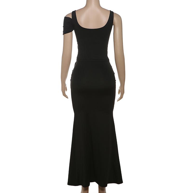 Ensemble mini-jupe dos nu en maille creuse irrégulière 