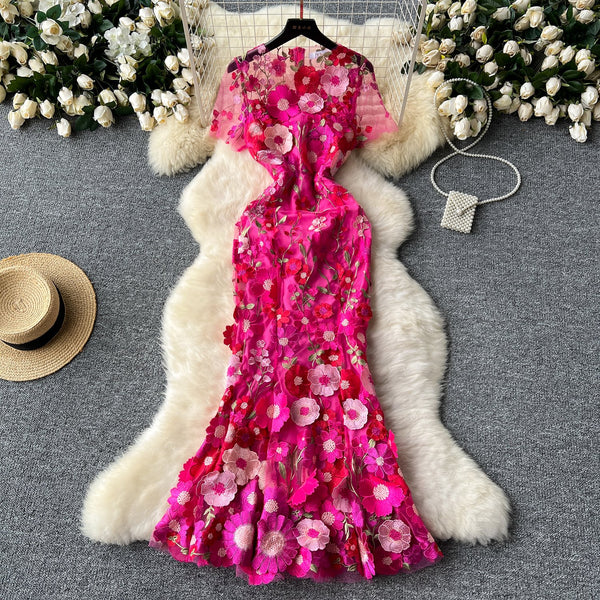Vestido largo con cuello redondo, manga corta, bordado de flores y cremallera 