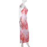 Vestido largo con escote halter, estampado de mariposas y abertura 