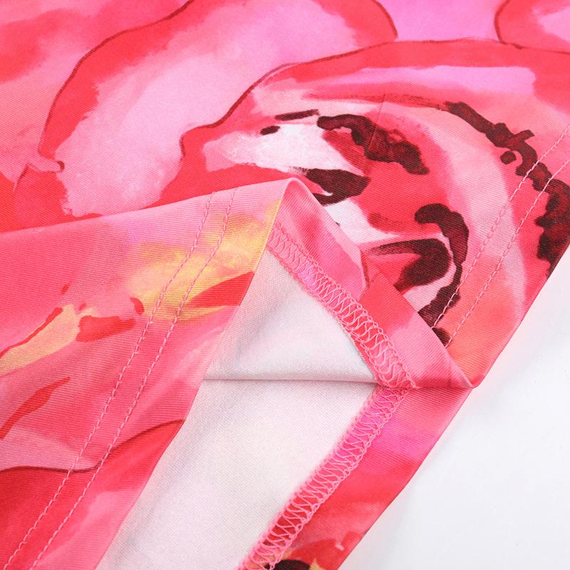 Vestido largo sin espalda con estampado floral, cuello vuelto y lazo anudado 