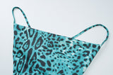Vestido largo camisola con cuello vuelto y espalda cruzada con estampado de leopardo 