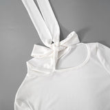 Hollow out bowknot self tie long sleeve solid top