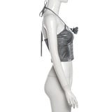 Top sin espalda con apliques florales y cuello halter con lazo 