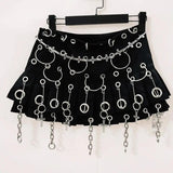 Ensemble mini-jupe plissée en cuir PU avec rivets et anneau licou 