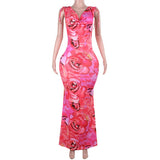 Vestido largo sin espalda con estampado floral, cuello vuelto y lazo anudado 