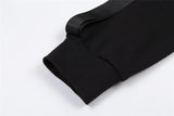 One shoulder long sleeve button irregular buckle top