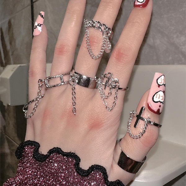Anillo de plata de 7 piezas con cadena de metal cruzada