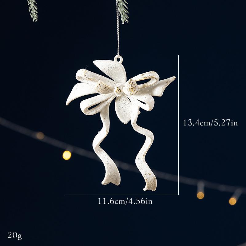 Decoración de árbol de Navidad con lazo blanco