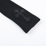 Top liso con cuello alto y manga larga con estampado cruzado 