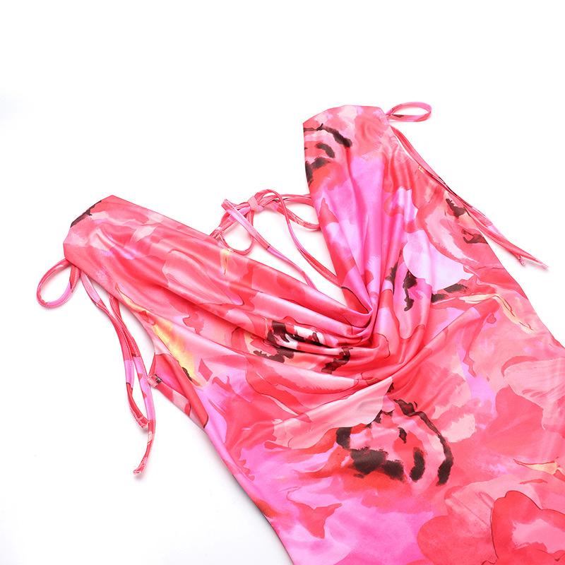 Vestido largo sin espalda con estampado floral, cuello vuelto y lazo anudado 