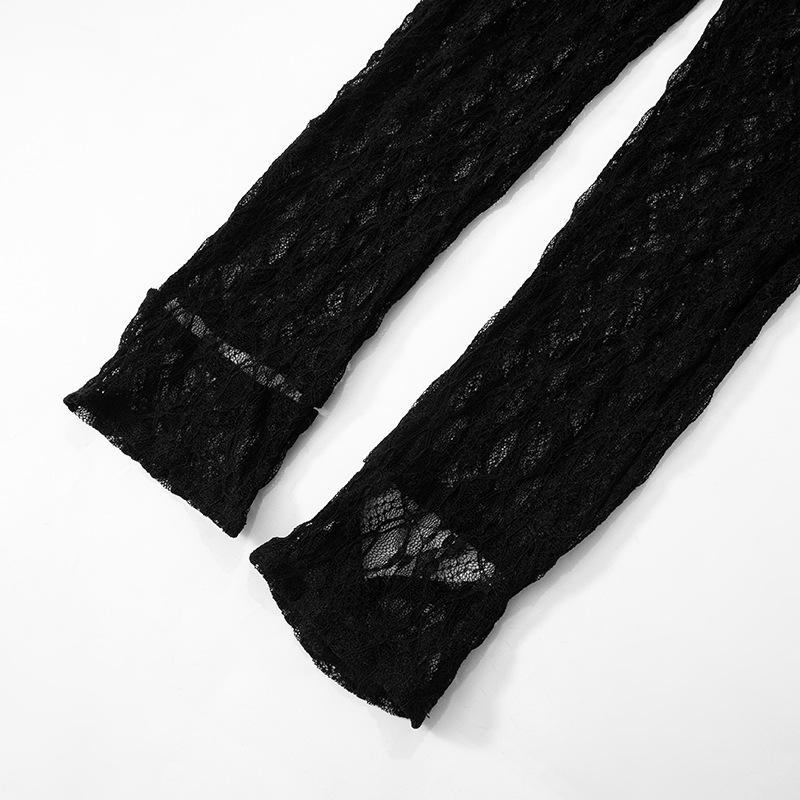 Mono de manga larga con encaje, cuello alto, cremallera y transparencias 