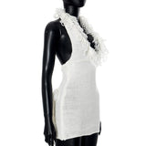 Minivestido de punto con espalda descubierta, borlas y cuello halter anudadas 