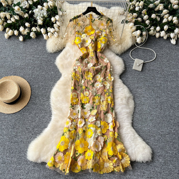Vestido largo con cuello redondo, manga corta, bordado de flores y cremallera 