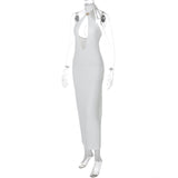 Vestido midi con cuello halter, espalda descubierta y aberturas con lazo 