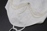 Top de tubo con apliques de flores, cordones y cuentas 