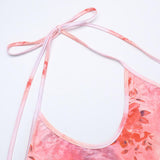 Vestido largo con escote halter, estampado de mariposas y abertura 