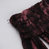 Vestido midi con volantes en contraste, abertura y manga larga con hombros descubiertos 