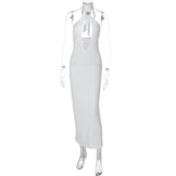 Vestido midi con cuello halter, espalda descubierta y aberturas con lazo 
