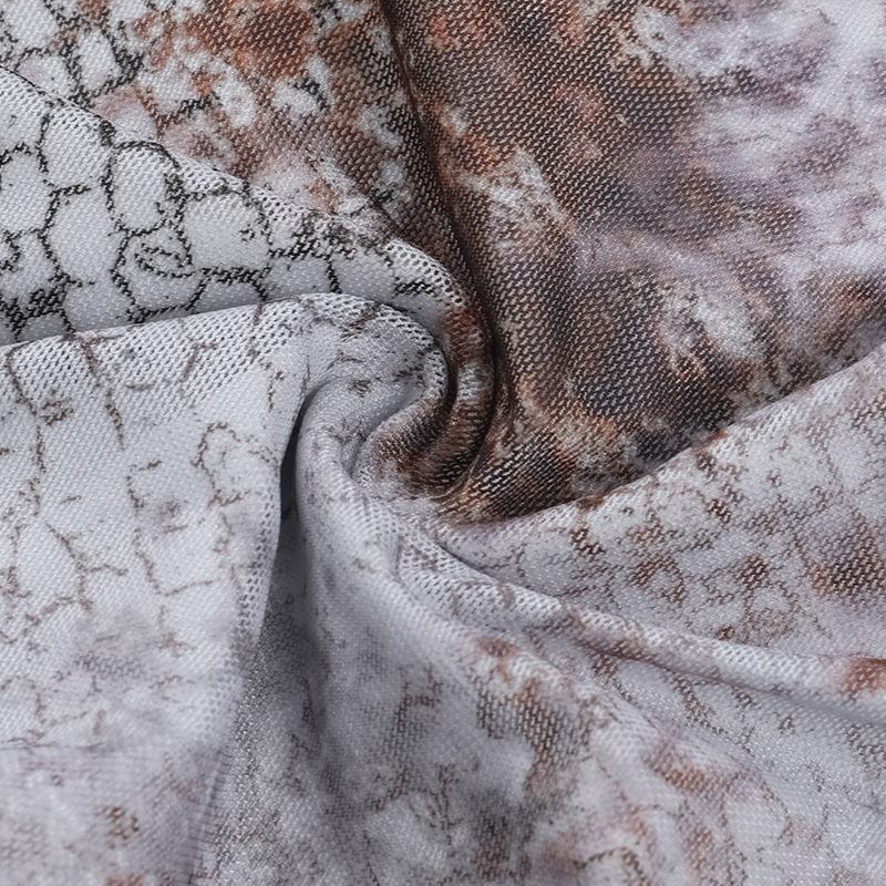Mini-robe froncée à volants et imprimé peau de serpent, dos nu et à nouer soi-même 