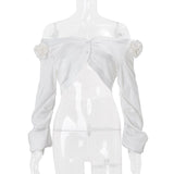 Long sleeve off shoulder flower applique button top
