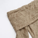Robe midi texturée fendue à manches longues évasées et épaules dénudées 