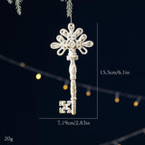 Decoración de árbol de Navidad con lazo blanco