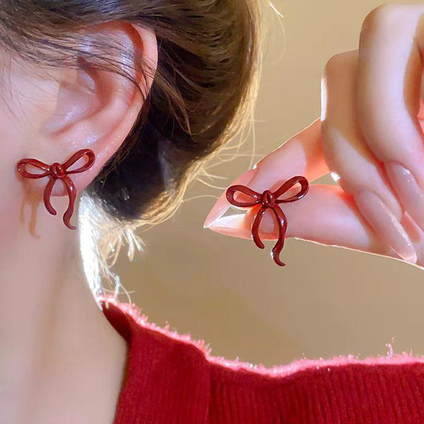 Boucles d'oreilles à tige en forme de cœur avec pendentif en fausse perle