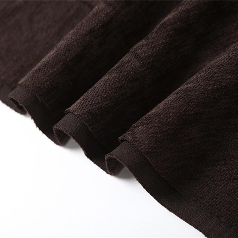 Mini-jupe à volants irréguliers et boucle en cuir PU 