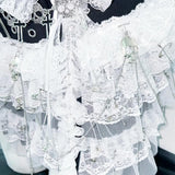 Conjunto de minifalda con lazo y apliques de calavera con dobladillo de encaje 