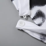 Top sin espalda con estampado de encaje y botones halter 