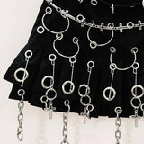 Ensemble mini-jupe plissée en cuir PU avec rivets et anneau licou 