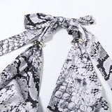 Conjunto de minifalda con estampado de cuello vuelto y lazo tipo halter 