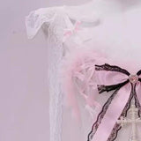 Ensemble mini-jupe rembourrée à col en V et ourlet en dentelle avec nœud papillon 
