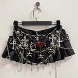 Cross applique pleated zip-up o ring mini skirt
