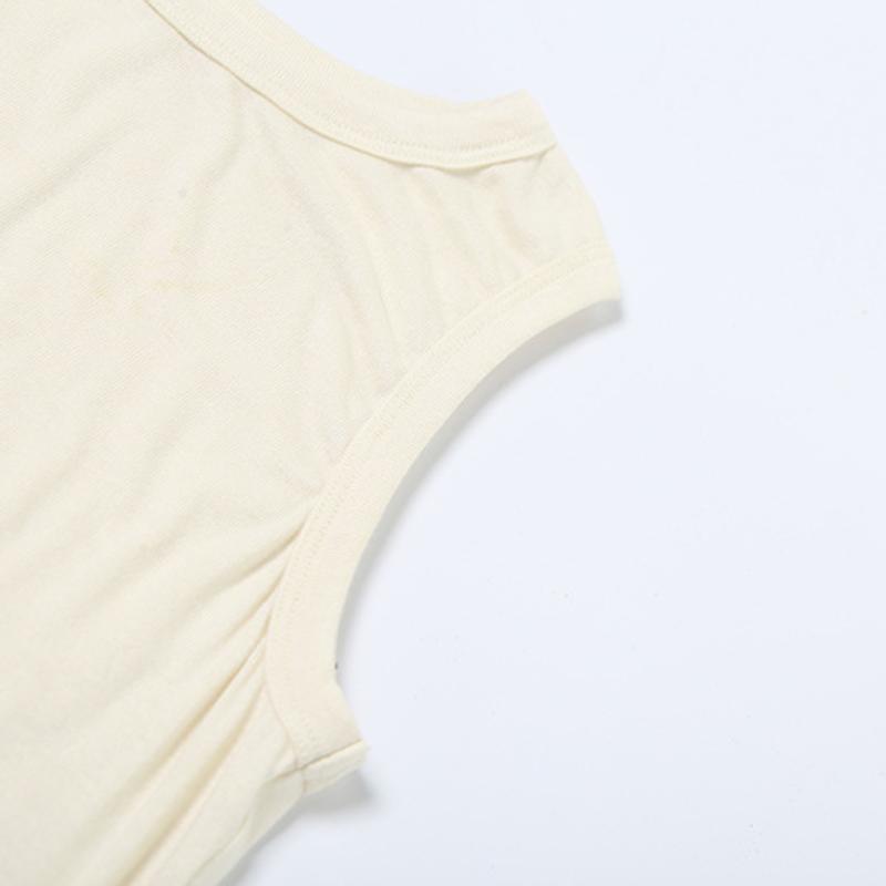 Crewneck irregular hollow out sleeveless solid top