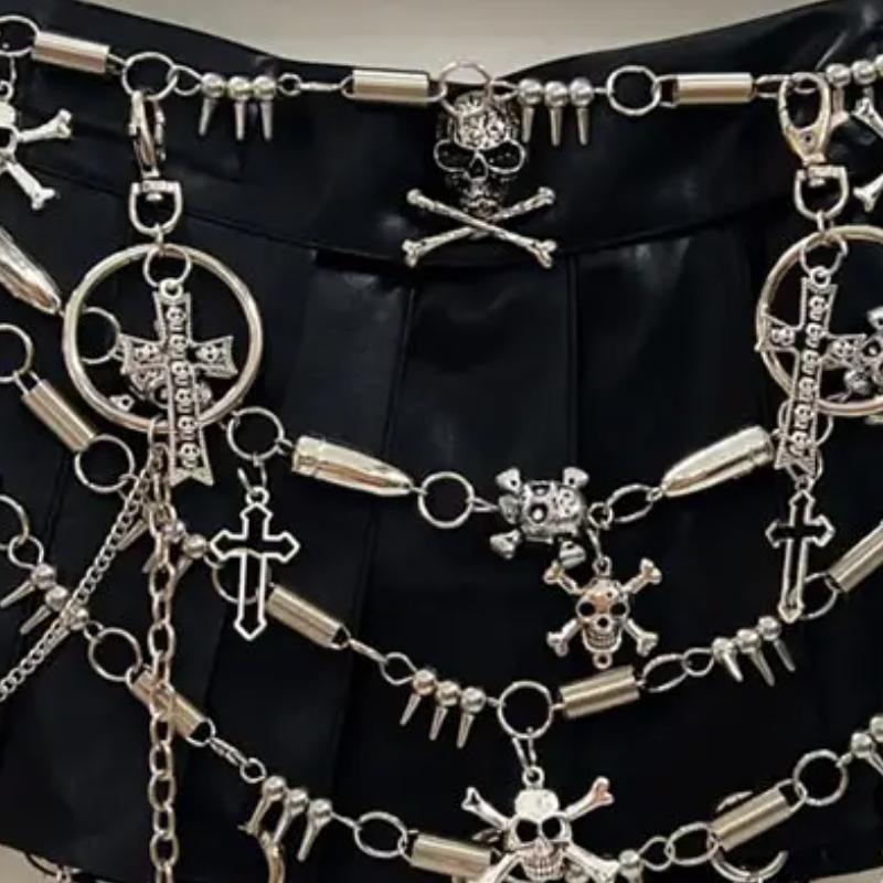 Mini-jupe plissée à motif tête de mort avec chaîne en métal et anneau en O 