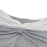 Vestido mini con textura fruncida, manga larga y hombros descubiertos 