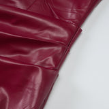 Vestido midi plisado de cuero sintético con cremallera y abertura 
