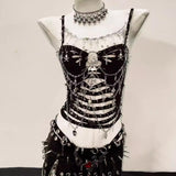 Haut camisole à anneau en O avec chaîne en métal ajourée et appliqué tête de mort 