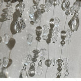 Haut caraco licou à chaîne métallique et pompons perlés 