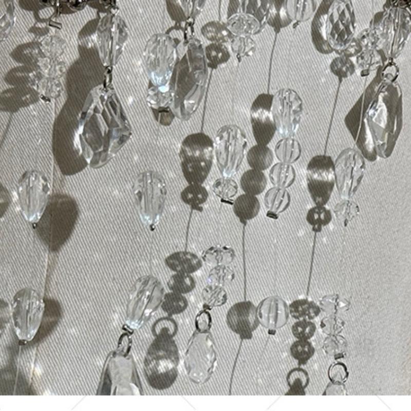 Haut caraco licou à chaîne métallique et pompons perlés 