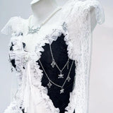 Conjunto de minifalda con lazo y apliques de calavera con dobladillo de encaje 
