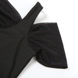 Ensemble mini-jupe dos nu en maille creuse irrégulière 