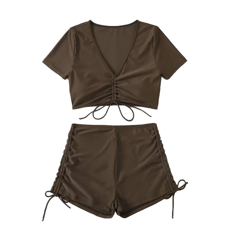 Traje de baño bikini con top corto y lazo ajustable de manga corta en color liso 